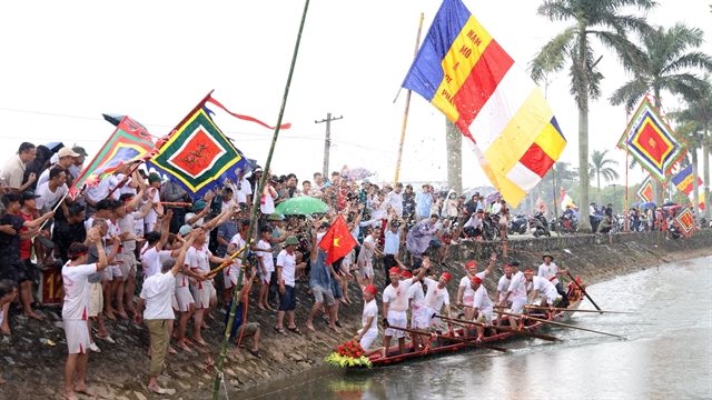 Hành Thiện's standing boat race: the Vietnamese festival where rowers race on their feet
