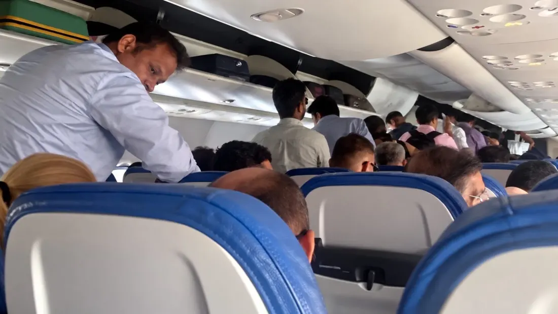 Air India Express Filmed Taxiing With Passengers Standing and Bins Wide Open
