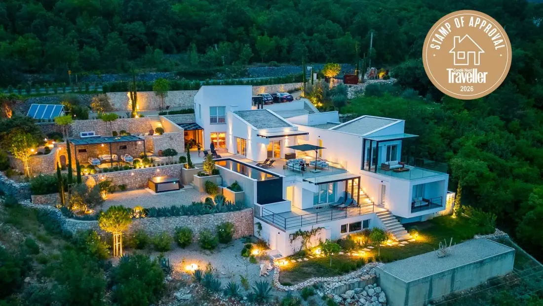 A hillside villa above Croatia's Kvarner Gulf, where griffon vultures drift past the infinity views