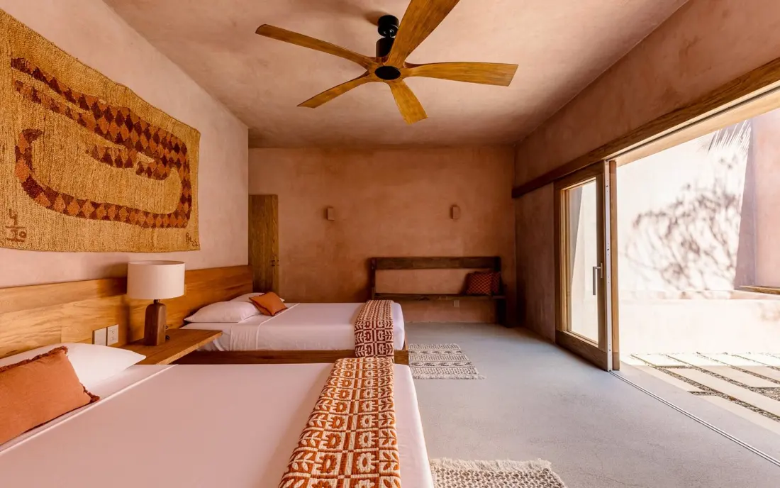 The rug is doing more work in your hotel bedroom than you think