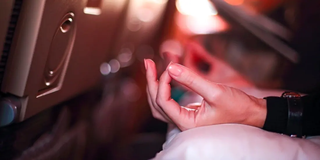 Six Stretches a Yoga Teacher Swears By on Long Flights — All Doable From Your Seat