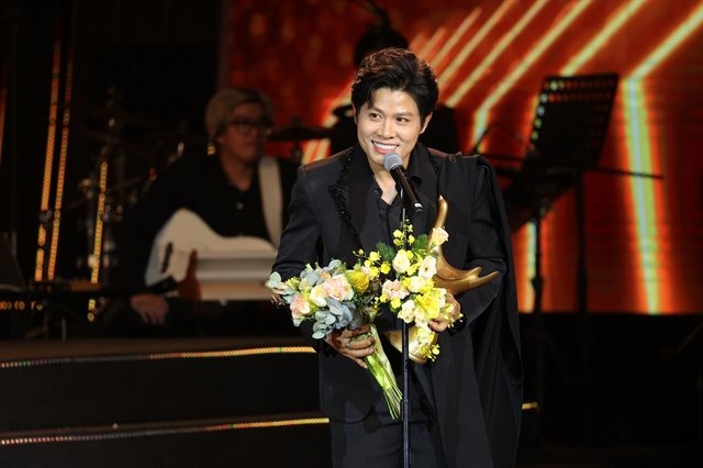 Tùng Dương marks 25 years on stage with a December mega-concert at Hanoi's Mỹ Đình Stadium