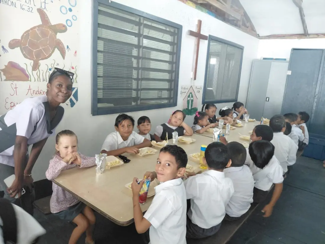 Caribbean Chicken Serves Free Breakfast to 500+ Students at San Pedro's Holy Cross School