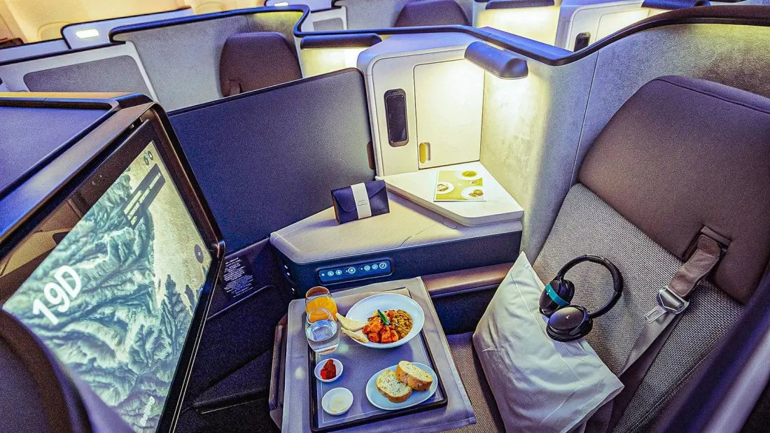 Boarded in Premium Economy, Sat Down in Business: How Cathay Pacific's Upgrade Lottery Really Works