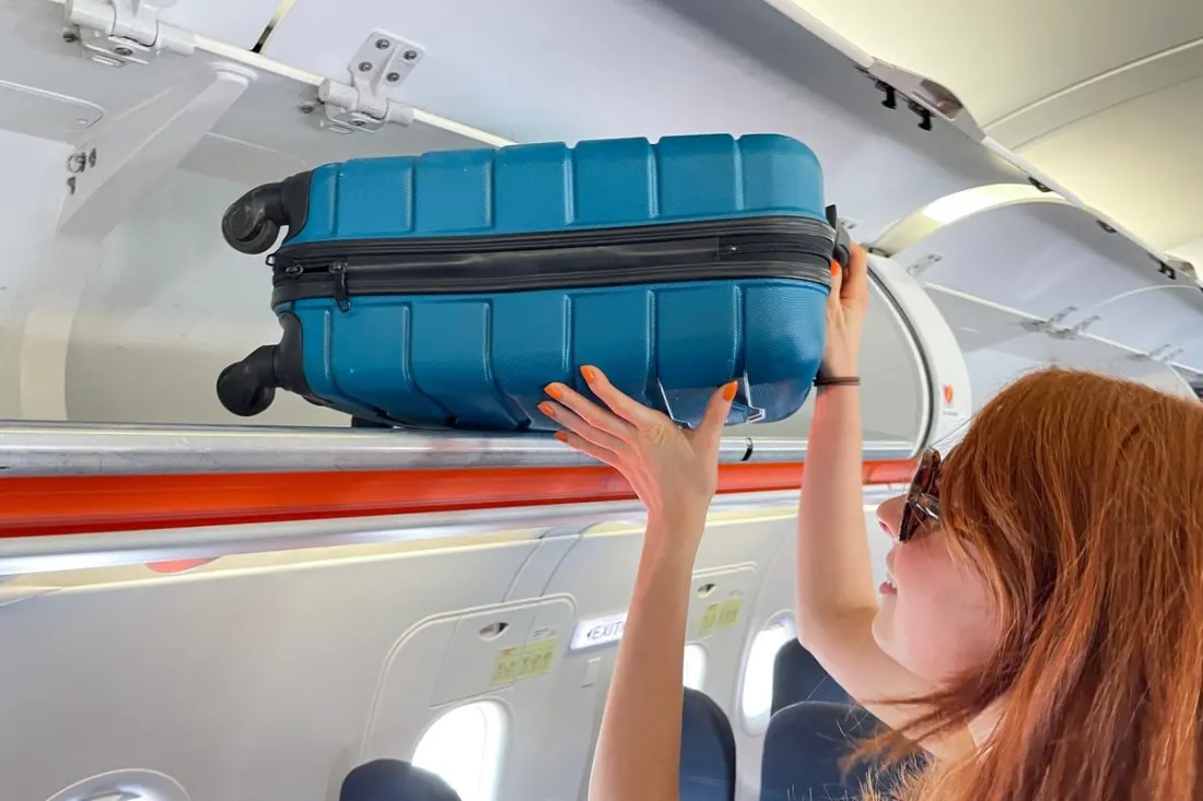 Why your carry-on keeps getting weighed, squeezed and charged – a pilot explains