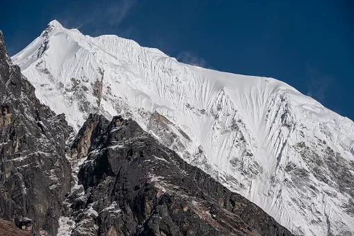 Avalanche at Himlung Himal base camp kills two guides as rescuers search for the missing